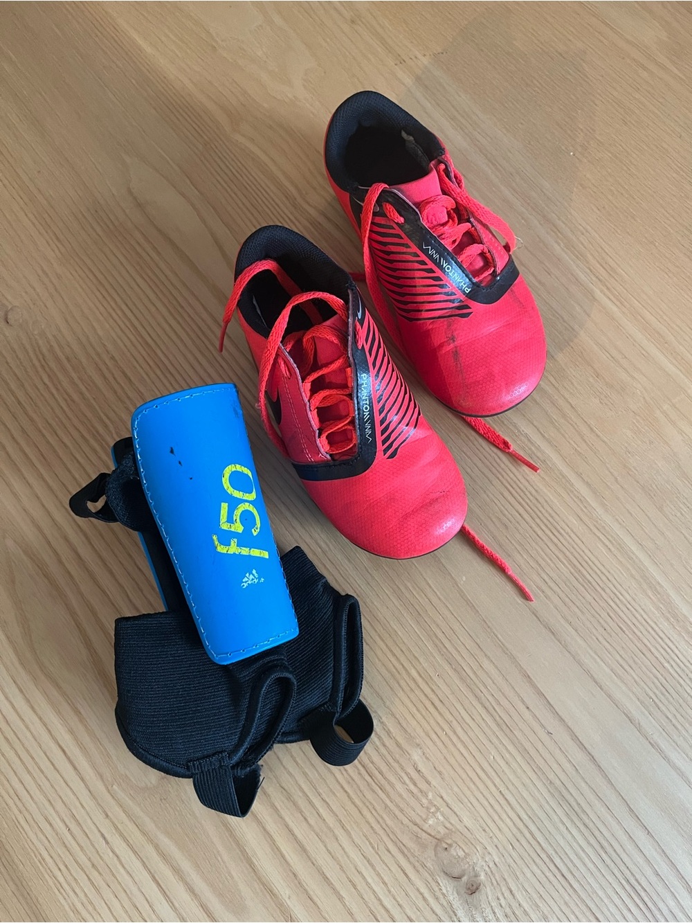 Kids Nike Size 12 Red Soccer Cleats with Blue Shin Guard Size Medium